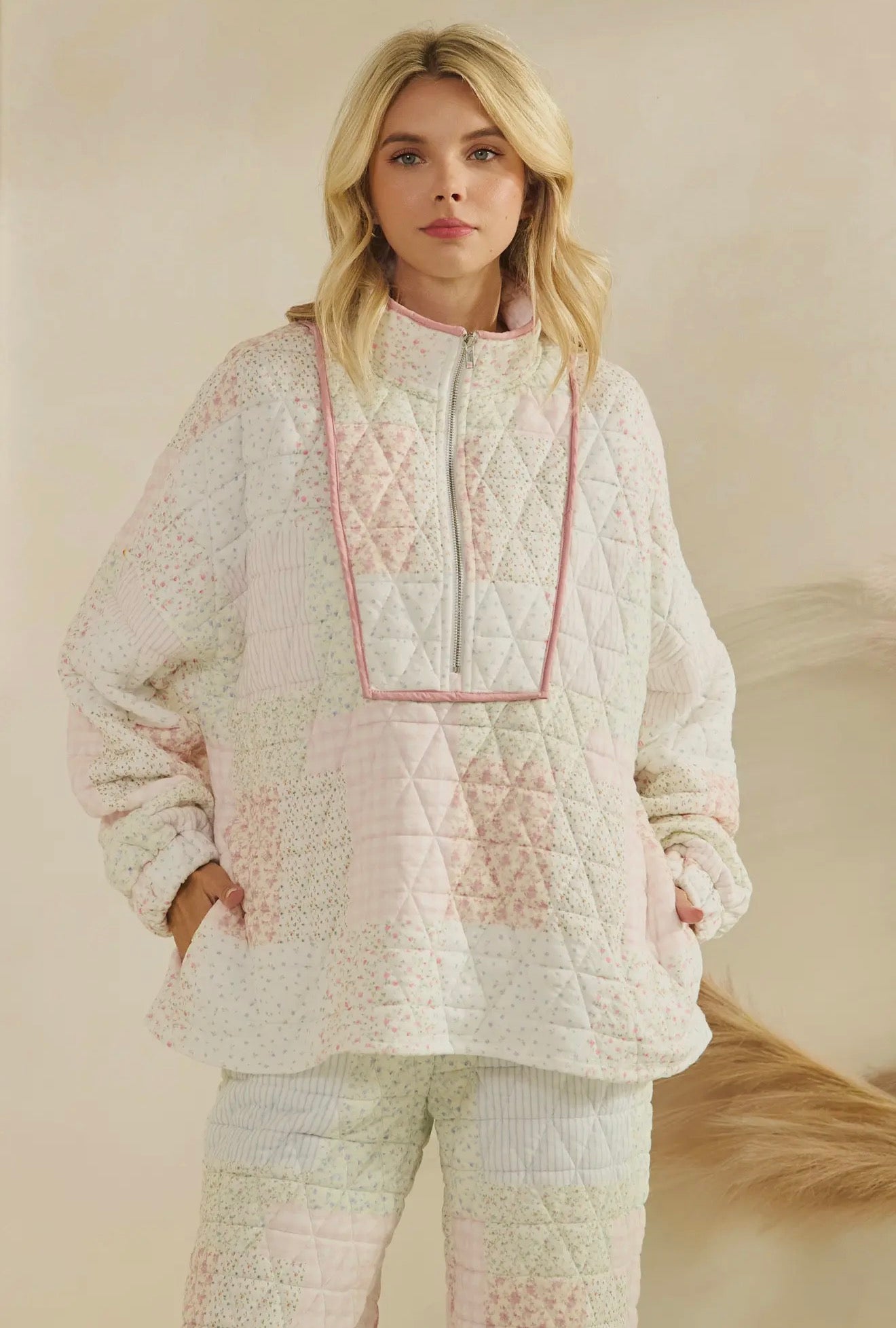 Floral textured quarter zip/pink